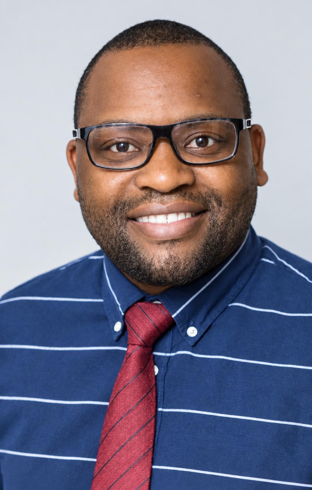 Dr Ernest D. Muserere